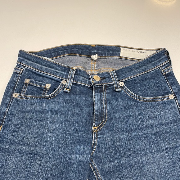 Rag & Bone skinny jeans with rips in the knees in a light medium wash. - Picture 2 of 7